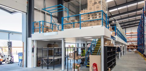 Mezzanine floor near door of warehouse