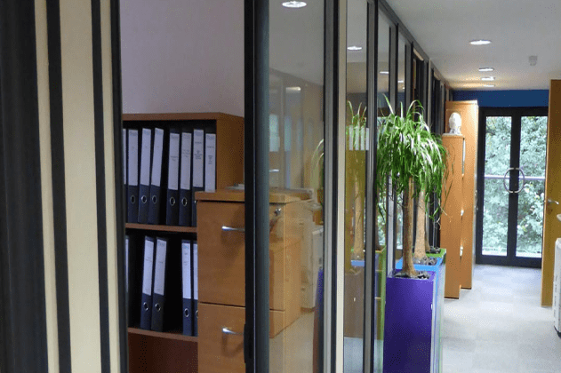 Office refurbishment in Blanchard Wells with glass partitions and bookcases