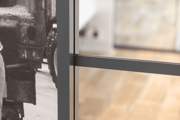 Office fit out and glass partitions in Shaftesbury with wall artwork and metal joining