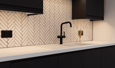 modern sink area with white tiles